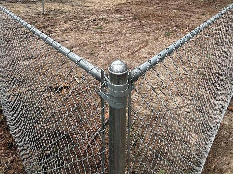 Galvanized chain link fence corner post with dome cap and tension bands
